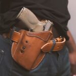 A Man with A Gun in A Leather Holster