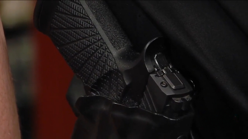 Close-Up of A Handgun in A Holster