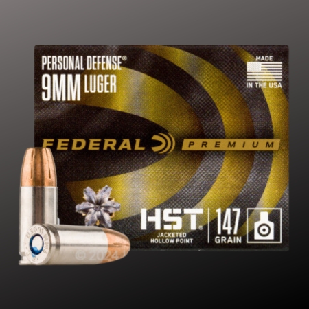 Box of Federal Premium 9mm Luger HST 147-grain jacketed hollow point ammunition with two rounds displayed