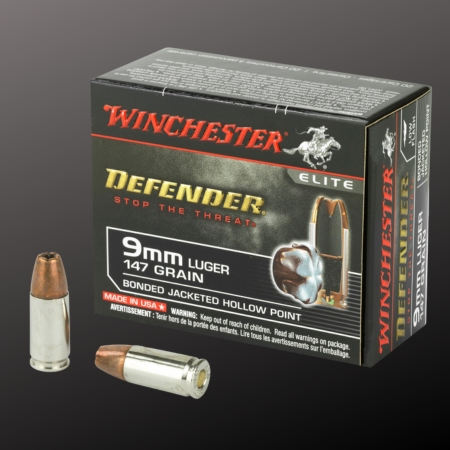 Winchester Defender 9mm Luger 147-grain JHP ammunition box with two rounds displayed