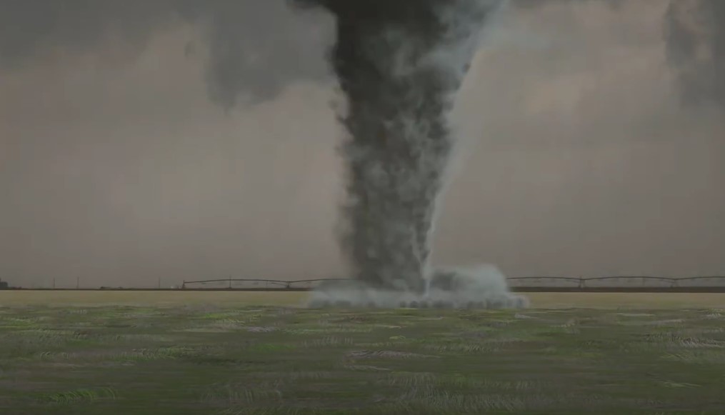 A powerful tornado descends upon a vast, flat landscape